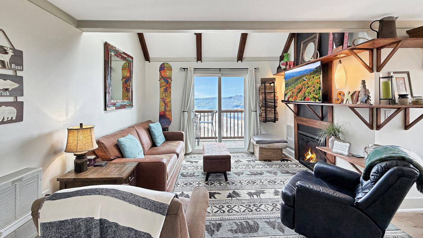 Warm one-bedroom mountain condo interior at Sugar Ski & Country Club