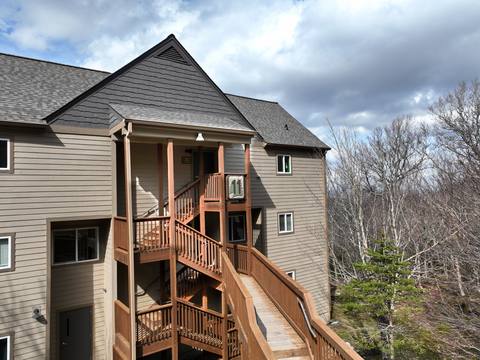 Entrance to the one-bedroom condo building at Sugar Ski & Country Club